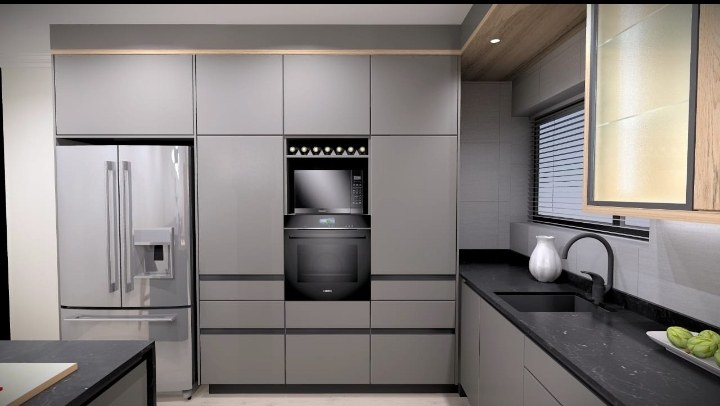 Graphite grey kitchen cabinetry with integrated appliances